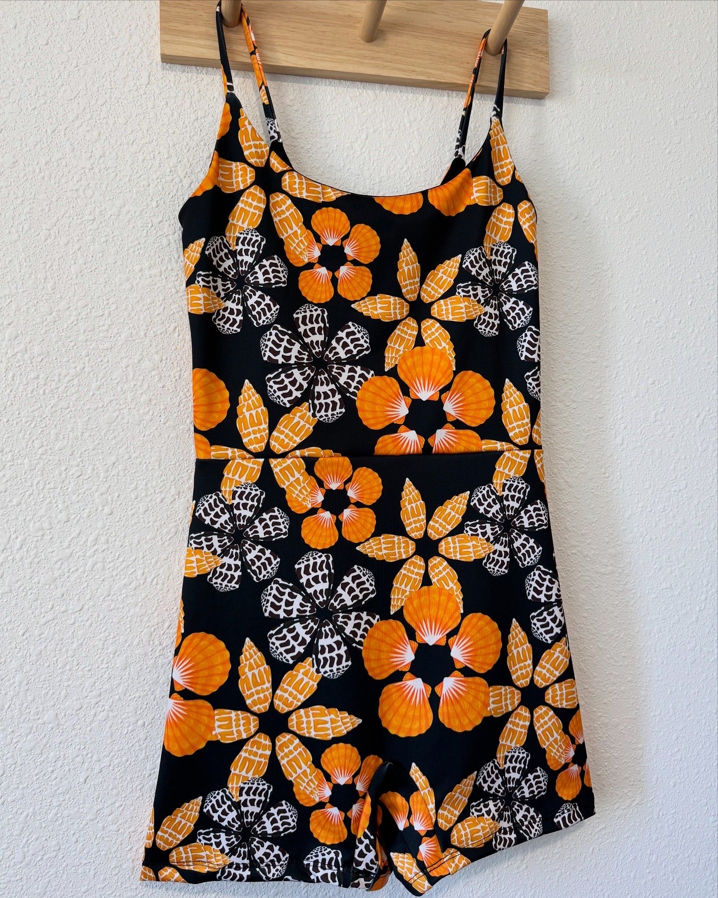 Maʻalahi Bodysuit in Black Pūpū Puas