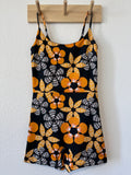 Maʻalahi Bodysuit in Black Pūpū Puas