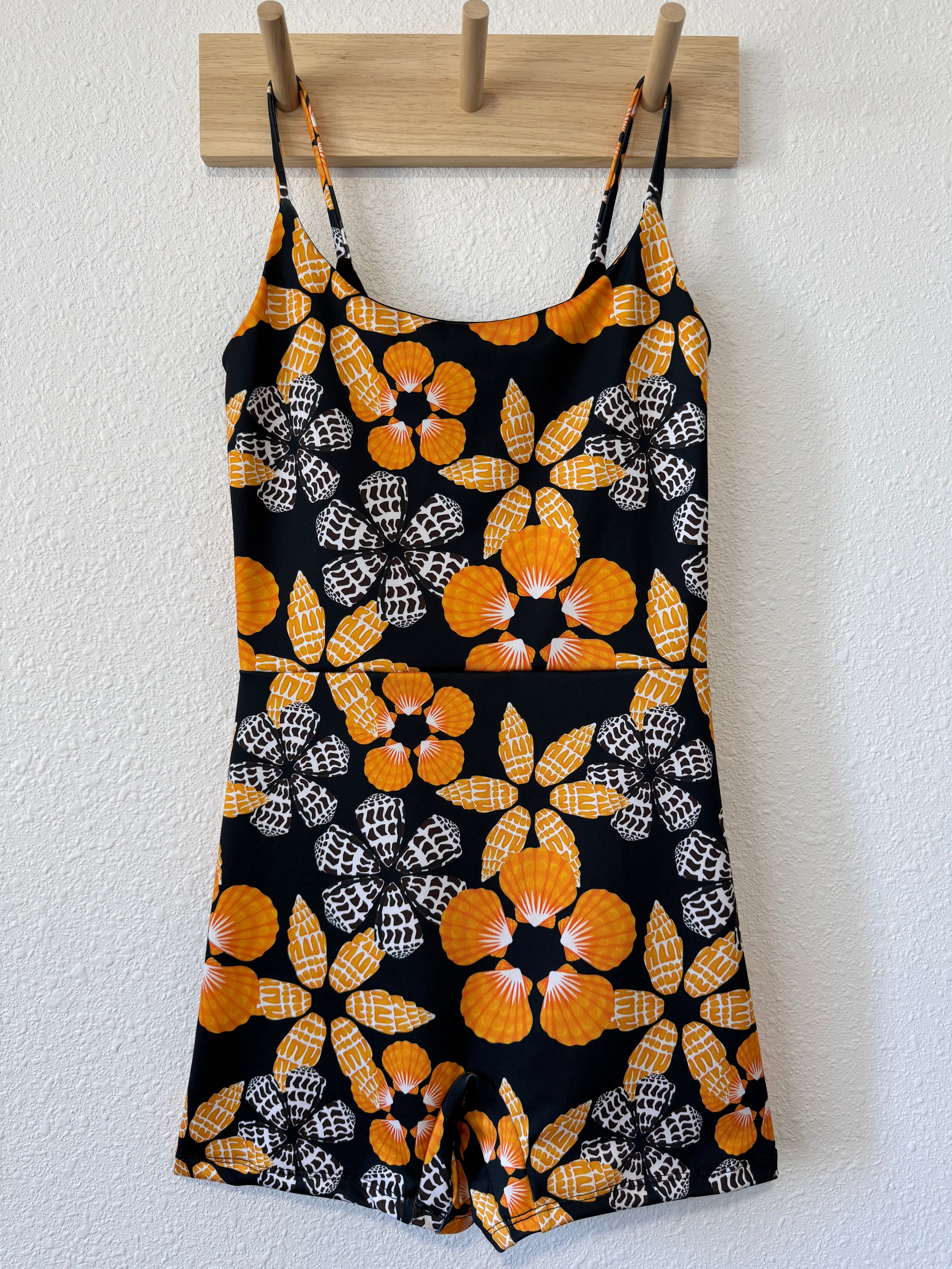 Maʻalahi Bodysuit in Black Pūpū Puas