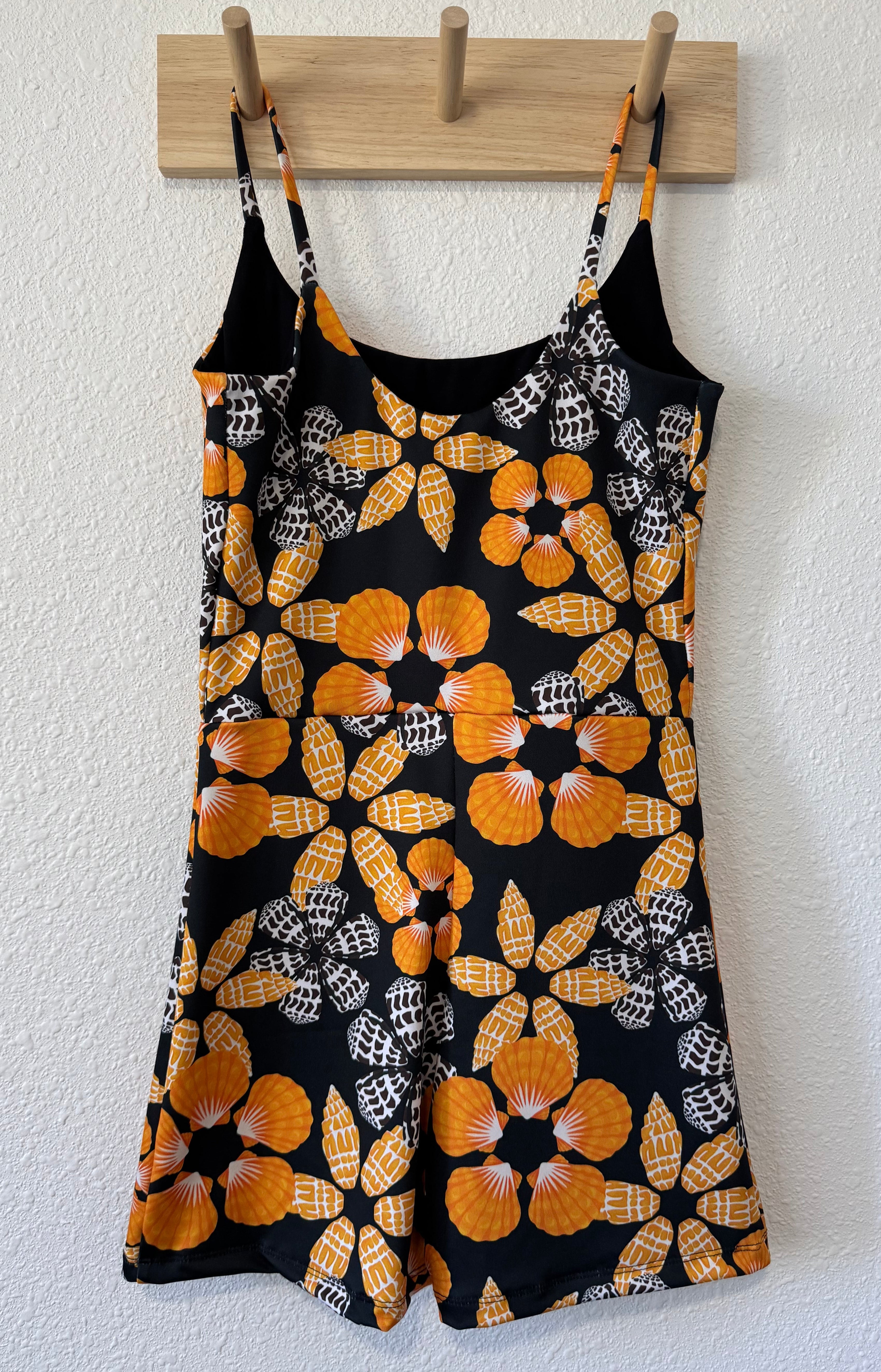 Maʻalahi Bodysuit in Black Pūpū Puas