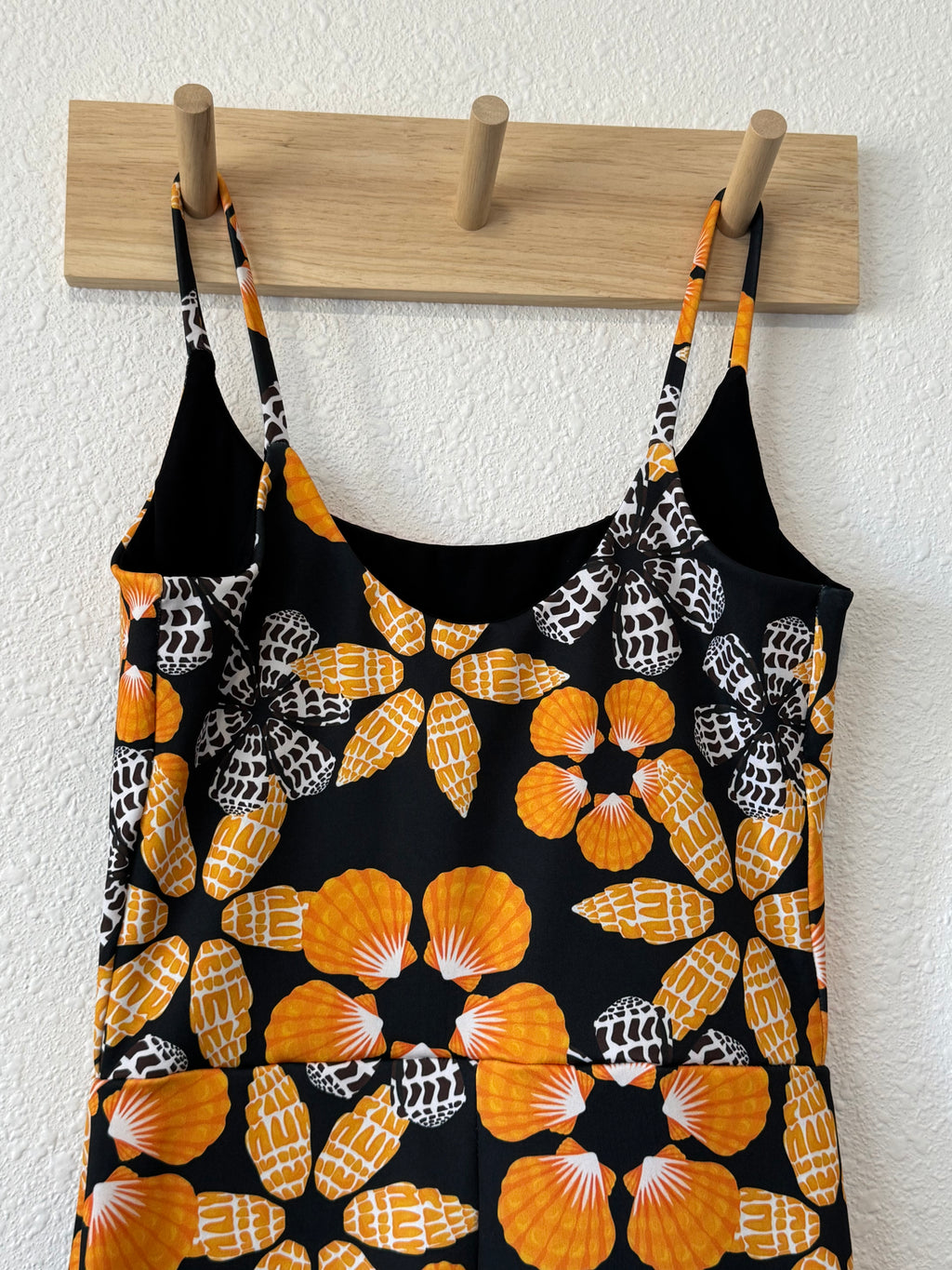 Maʻalahi Bodysuit in Black Pūpū Puas